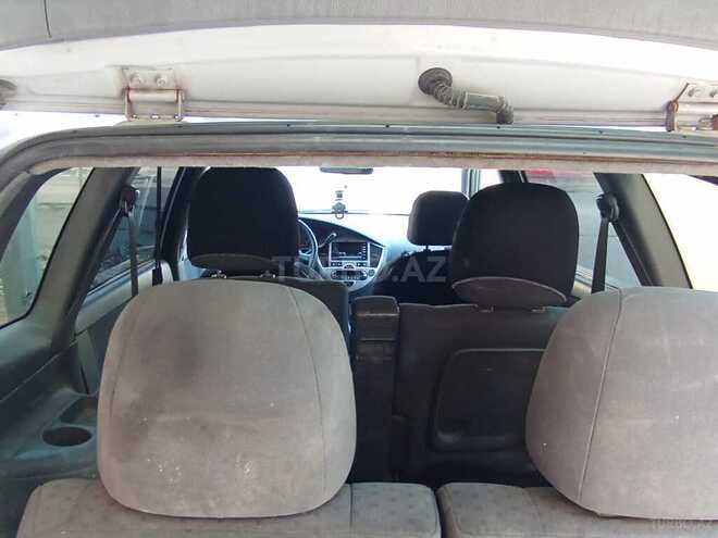 Kia Carens 2004, 200,000 km - 2.0 l - Bakı