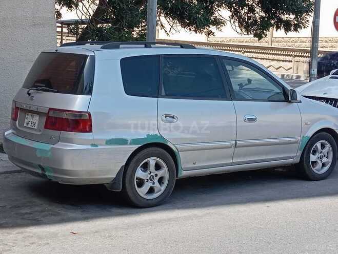 Kia Carens 2004, 200,000 km - 2.0 l - Bakı