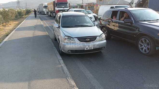 Kia Carens 2004, 200,000 km - 2.0 l - Bakı