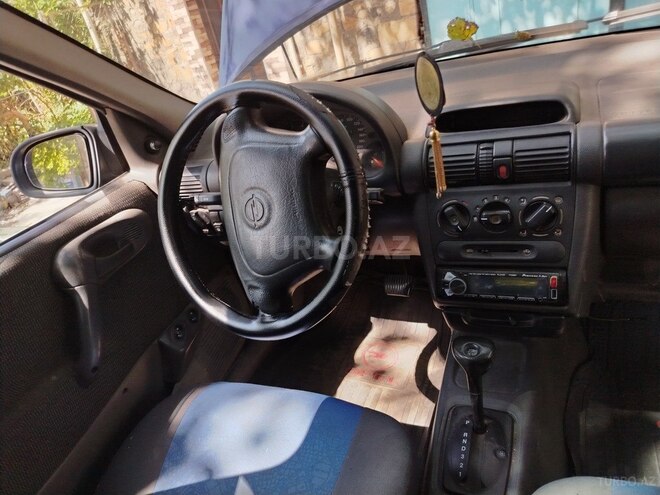 Opel Vita 1997, 320,000 km - 1.4 l - Qax