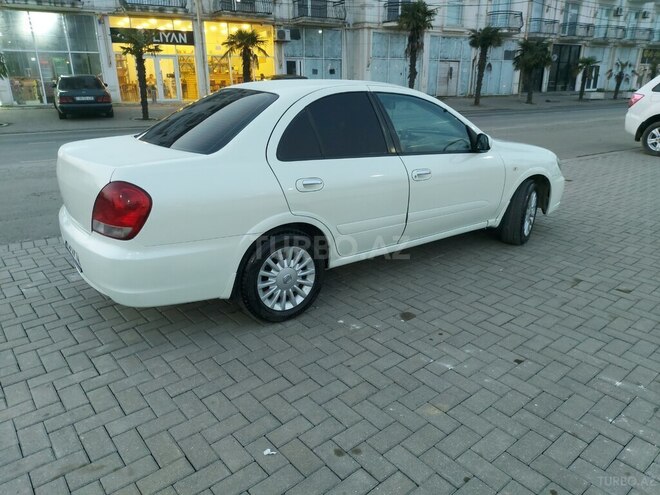 Nissan Sunny 2010, 300,000 km - 1.6 l - Bakı