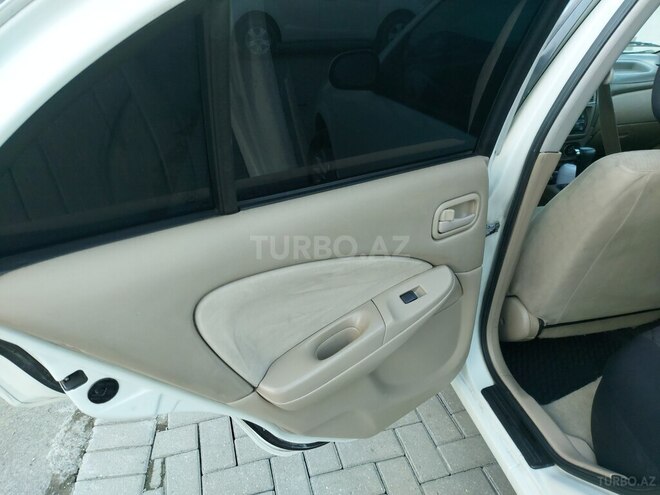 Nissan Sunny 2010, 300,000 km - 1.6 l - Bakı