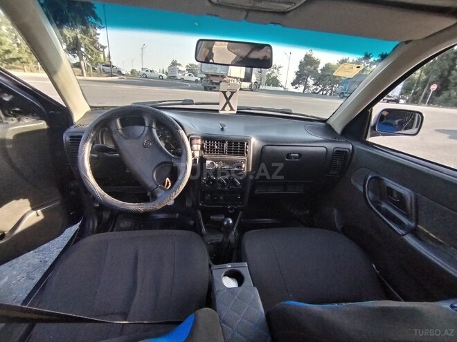 Volkswagen Polo 1997, 100,000 km - 1.4 л - Qax