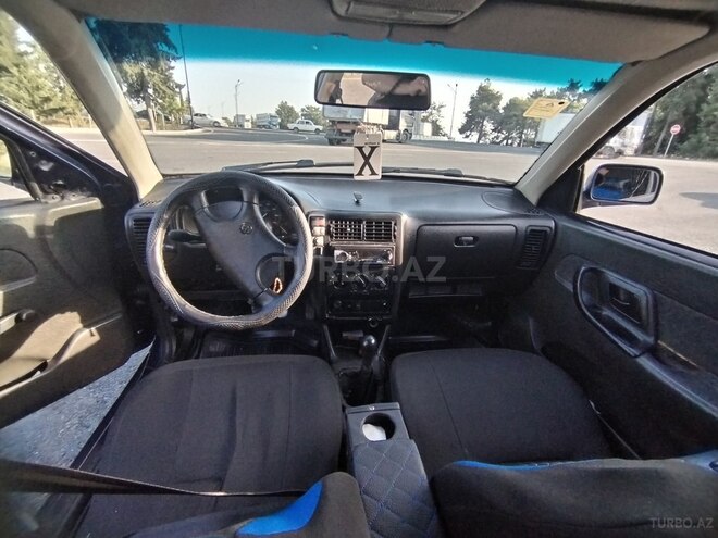 Volkswagen Polo 1997, 100,000 km - 1.4 л - Qax