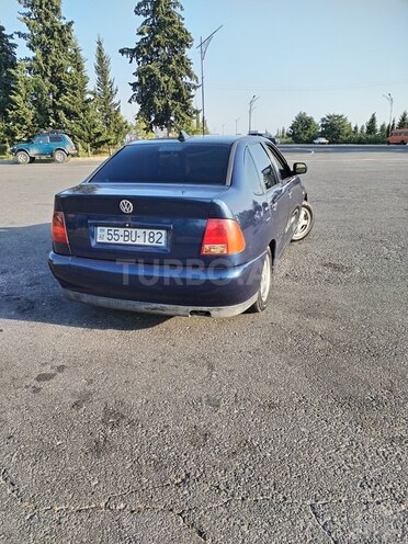 Volkswagen Polo 1997, 100,000 km - 1.4 л - Qax