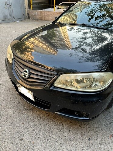 Nissan Sunny 2010, 234,000 km - 1.6 l - Bakı