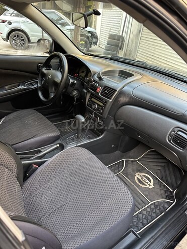 Nissan Sunny 2010, 234,000 km - 1.6 l - Bakı