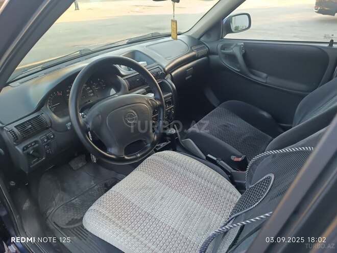 Opel Astra 1997, 302,000 km - 1.6 l - Bakı
