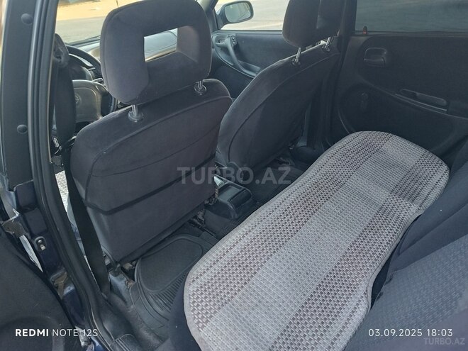 Opel Astra 1997, 302,000 km - 1.6 l - Bakı
