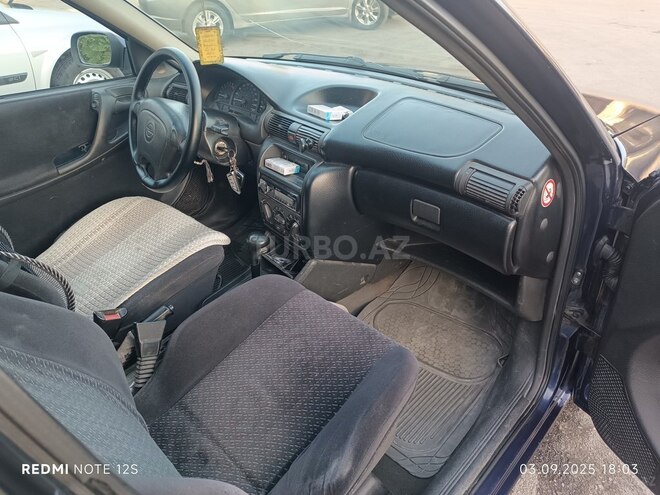 Opel Astra 1997, 302,000 km - 1.6 l - Bakı