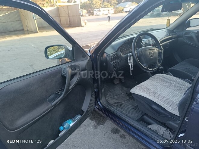 Opel Astra 1997, 302,000 km - 1.6 l - Bakı