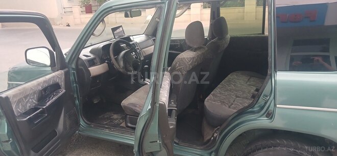 Mitsubishi Pajero io 1999, 111,111 km - 2.0 l - Bakı