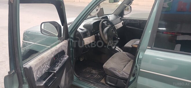Mitsubishi Pajero io 1999, 111,111 km - 2.0 l - Bakı