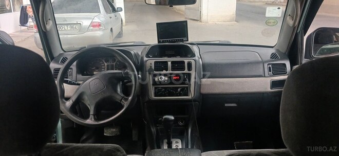 Mitsubishi Pajero io 1999, 111,111 km - 2.0 l - Bakı