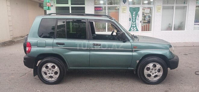 Mitsubishi Pajero io 1999, 111,111 km - 2.0 l - Bakı