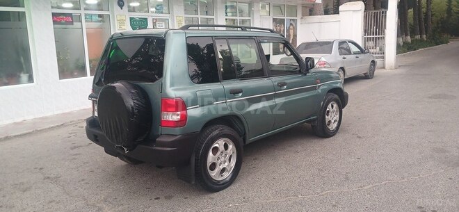 Mitsubishi Pajero io 1999, 111,111 km - 2.0 l - Bakı