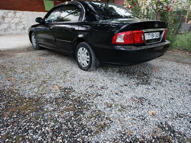 Kia Optima 2005, 489,360 km - 2.4 l - Ucar