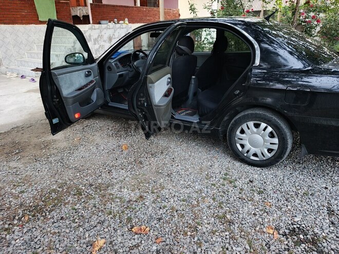 Kia Optima 2005, 489,360 km - 2.4 l - Ucar