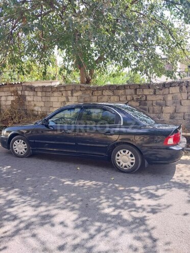 Kia Optima 2005, 489,360 km - 2.4 l - Ucar