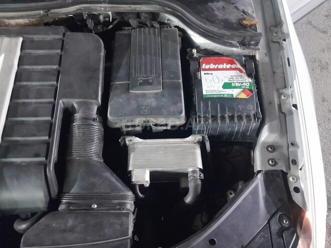 Volkswagen Passat 2006, 303,000 km - 2.0 l - Bakı