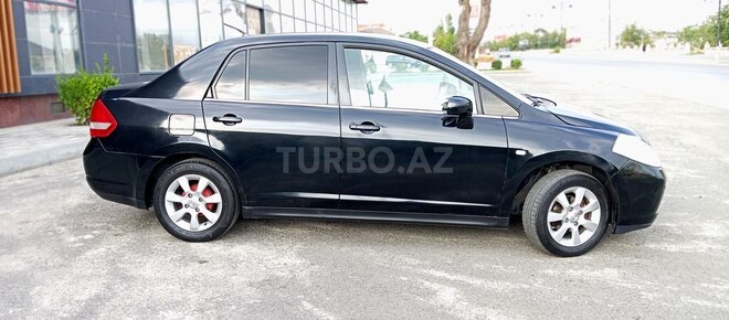 Nissan Tiida 2008, 296,000 km - 1.6 l - Quba