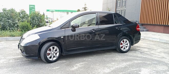 Nissan Tiida 2008, 296,000 km - 1.6 l - Quba