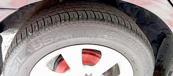 Nissan Tiida 2008, 296,000 km - 1.6 l - Quba