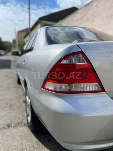 Nissan Sunny 2010, 284,000 km - 1.6 l - Bakı