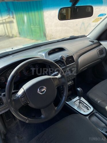 Nissan Sunny 2010, 284,000 km - 1.6 l - Bakı