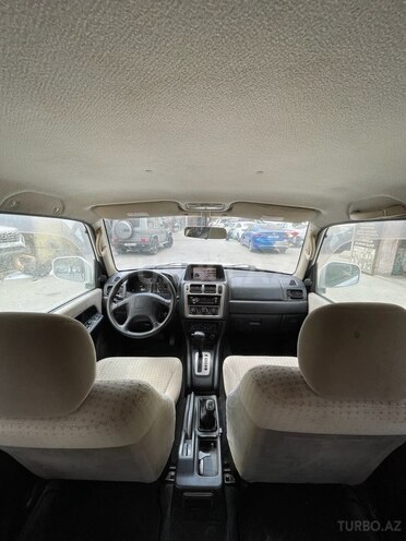 Mitsubishi Pajero io 2002, 242,000 km - 2.0 л - Bakı