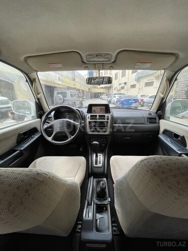 Mitsubishi Pajero io 2002, 242,000 km - 2.0 л - Bakı