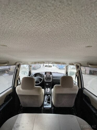 Mitsubishi Pajero io 2002, 242,000 km - 2.0 л - Bakı