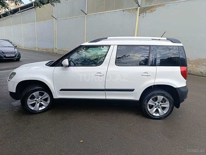 Skoda Yeti 2012, 321,510 km - 1.2 l - Bakı