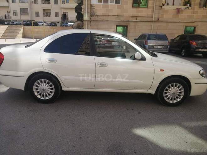 Nissan Sunny 2008, 222,437 km - 1.6 l - Qax