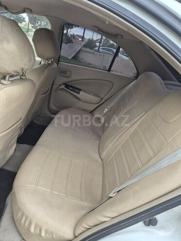 Nissan Sunny 2010, 370,000 km - 1.6 l - Bakı