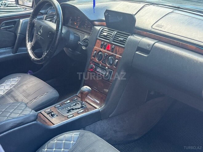 Mercedes E 230 1997, 256,666 km - 2.3 l - Bakı