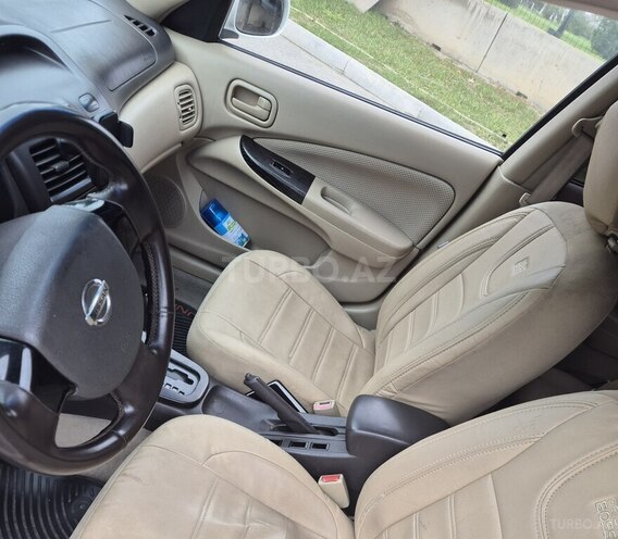 Nissan Sunny 2010, 370,000 km - 1.6 l - Bakı
