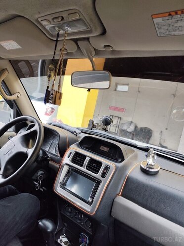 Mitsubishi Pajero io 2004, 320,000 km - 2.0 l - Bakı