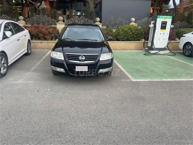 Nissan Sunny 2009, 370,000 km - 1.6 l - Bakı
