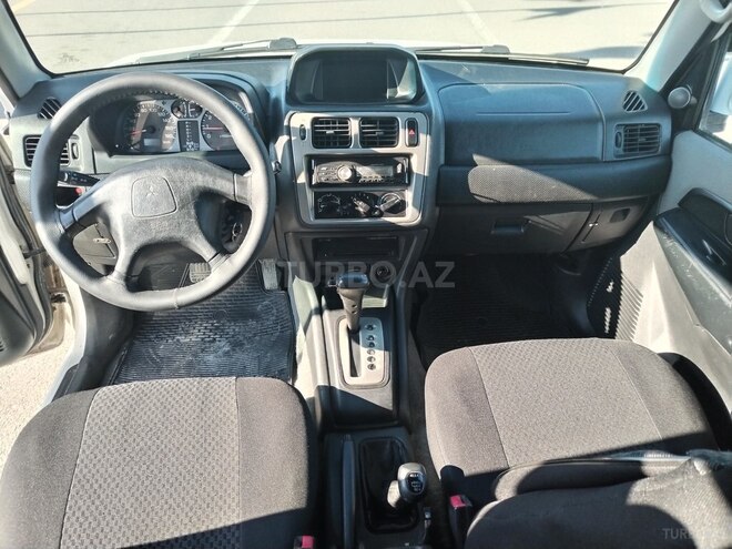 Mitsubishi Pajero io 1999, 303,303 km - 1.8 l - Gəncə