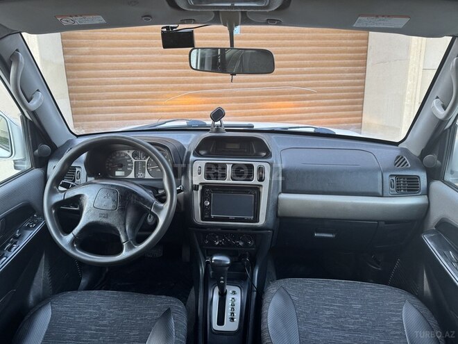 Mitsubishi Pajero io 1999, 390,000 km - 1.8 л - Bakı