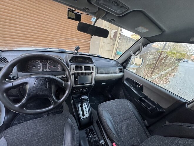 Mitsubishi Pajero io 1999, 390,000 km - 1.8 л - Bakı