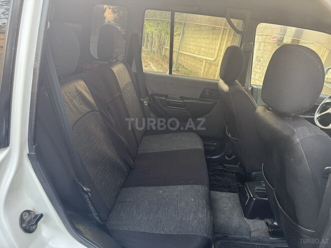 Mitsubishi Pajero io 1999, 390,000 km - 1.8 л - Bakı