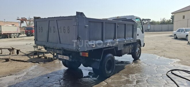 Isuzu NKR 66 E-9