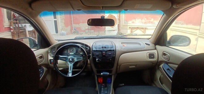 Nissan Sunny 2006, 289,000 km - 1.3 l - Bakı