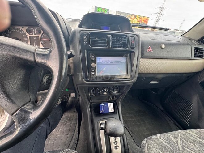 Mitsubishi Pajero io 1999, 404,864 km - 1.8 л - Bakı