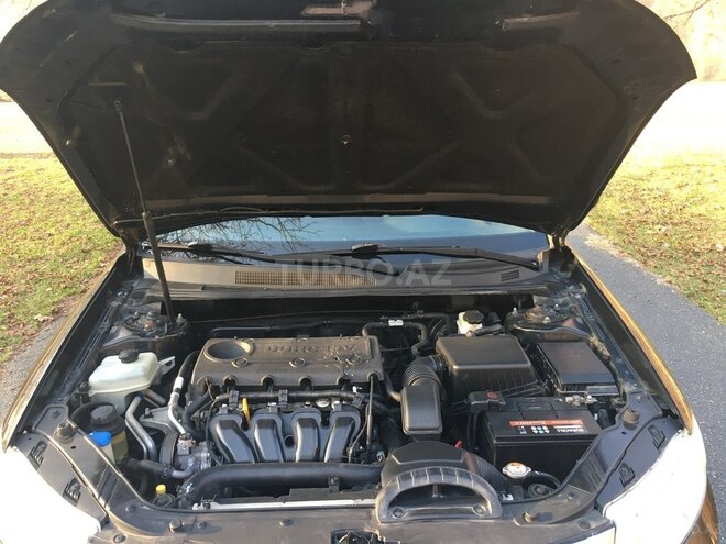 Kia Optima 2010, 251,000 km - 2.0 l - Qax