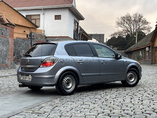 Opel Astra 2009, 330,000 km - 1.4 l - Qax