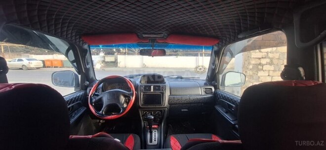 Mitsubishi Pajero io 1999, 264,312 km - 1.8 l - Bakı