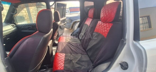Mitsubishi Pajero io 1999, 264,312 km - 1.8 l - Bakı